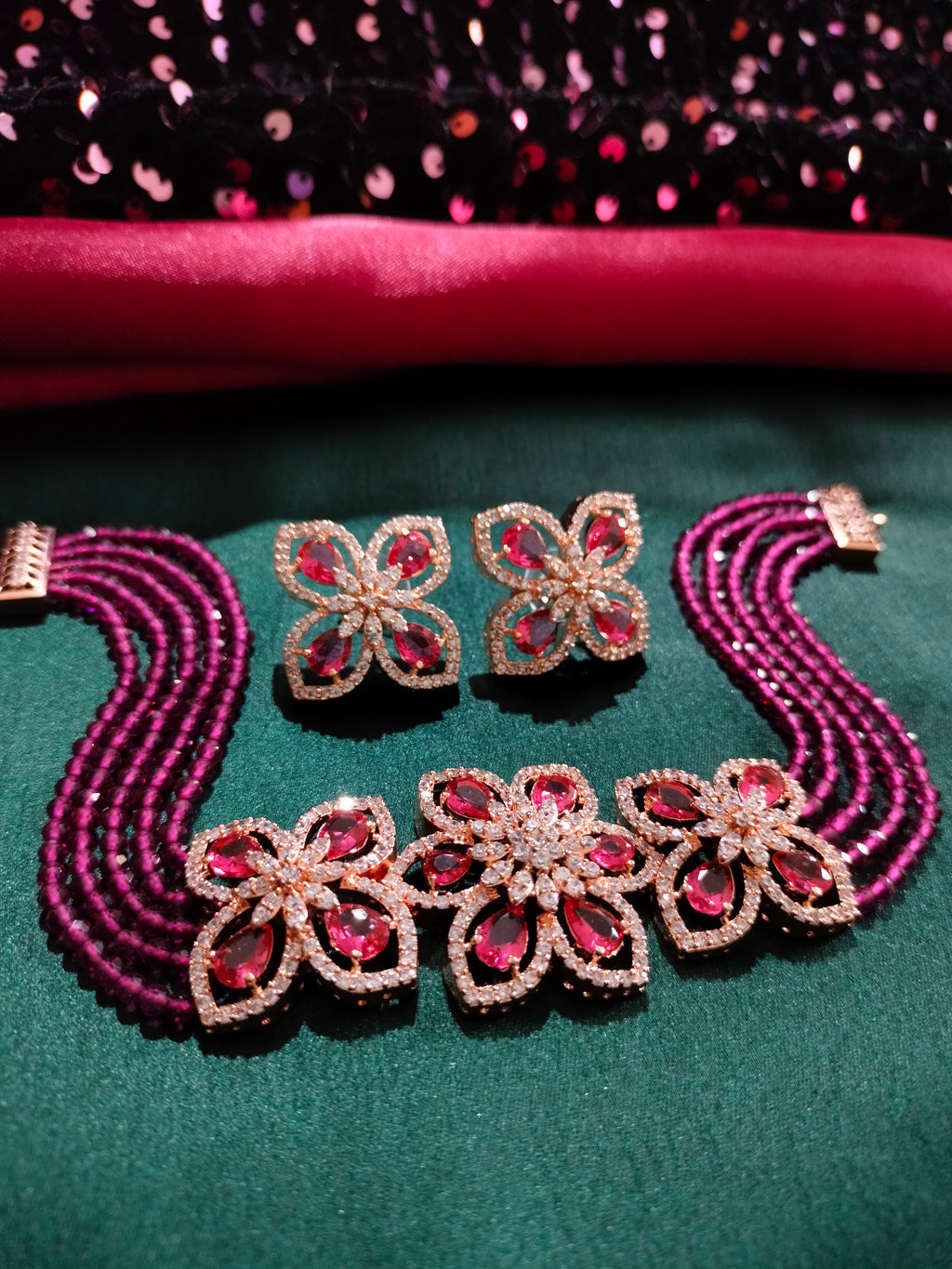 N0500_Classy Magenta crystal flower design choker necklace set studded  with  American diamond stones.