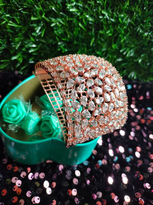 B0310_Designer rose gold broad  bracelets studded with delicate work of american diamond stones.