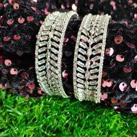 B0313_Elegant broad silver shade designer American Diamond bangles with delicate stone work.