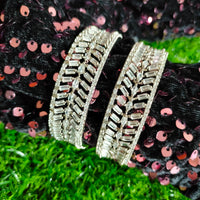 B0313_Elegant broad silver shade designer American Diamond bangles with delicate stone work.