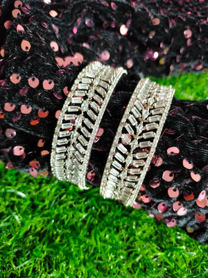 B0313_Elegant broad silver shade designer American Diamond bangles with delicate stone work.