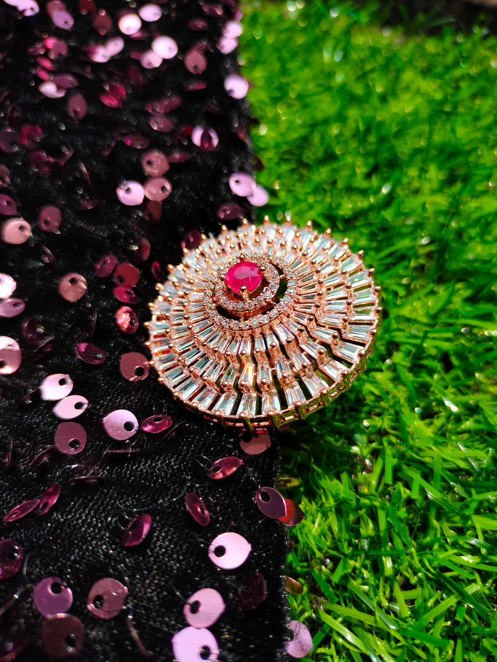 R047_Grand circular design  statement ring  studded with American Diamond stones with a touch of red stone.