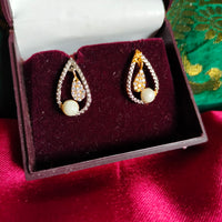 E0869_Lovely American diamond studs with a touch of pearls.