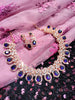 N0550_Lovely rose gold choker necklace embellished with american diamond stones with a touch of blue stones.
