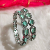 B0315_Elegant silver shade designer American Diamond bangles with a touch of sea green stones.