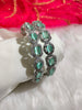 B0315_Elegant silver shade designer American Diamond bangles with a touch of sea green stones.