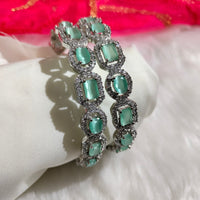 B0315_Elegant silver shade designer American Diamond bangles with a touch of sea green stones.