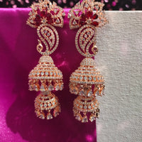 E0871_Ravishing grand layered peacock design rose gold jumkas with delicate stone work with a touch of red stone.