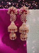 E0871_Ravishing grand layered peacock design rose gold jumkas with delicate stone work with a touch of red stone.