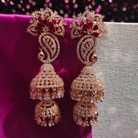 E0871_Ravishing grand layered peacock design rose gold jumkas with delicate stone work with a touch of red stone.