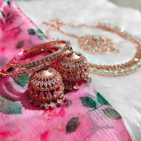 N0574_Elegant designer rose gold american diamond embellished necklace set with a touch of light green colour stones.