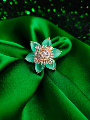R067_Gorgeous flower design American Diamond studded statement ring studded with sea green color stones.