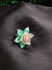 R067_Gorgeous flower design American Diamond studded statement ring studded with sea green color stones.