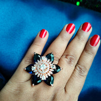 R063_Gorgeous flower design American Diamond studded statement ring studded with navy blue colour stones.