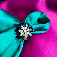 R058_Elegant flower design American Diamond studded statement ring with a touch of blue stones.