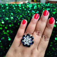 R058_Elegant flower design American Diamond studded statement ring with a touch of blue stones.