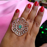 R071_Grand Designer American Diamond studded statement ring studded with a touch of sea green stones.