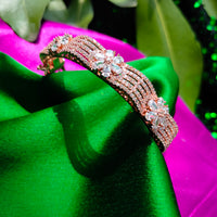 B0325_Elegant rose gold designer bracelets studded with delicate work of american diamond stones.
