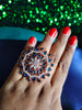 R080_Classic Grand circular design rose gold American Diamond studded statement ring with a touch of blue stones.