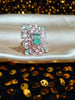 R085_Classy square design rose gold American Diamond studded statement ring with a touch of sea green stone.