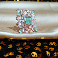 R085_Classy square design rose gold American Diamond studded statement ring with a touch of sea green stone.