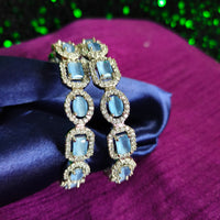 B0319_ Royal style Silver plated bangles studded with  American Diamond stones with a touch of blue stones.