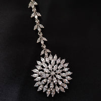 M033_Elegant circular floral design American diamond studded Maang tika with delicate stone work.