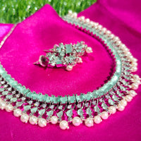 N01148_Grand Lovely designer Silver polished choker necklace embellished with American diamond stones with delicate mint green and pearl work.