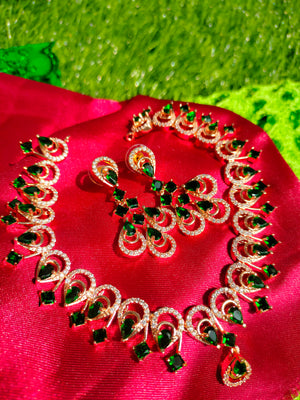 N01250_Gorgeous  designer rose gold american diamond embellished necklace set with a touch of  leafy green stones.