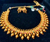 Pleasing and graceful necklaces laden with exquisite work of Temple jewelry structure and ruby stones
