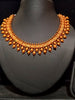 Pleasing and graceful necklaces laden with exquisite work of Temple jewelry structure and ruby stones