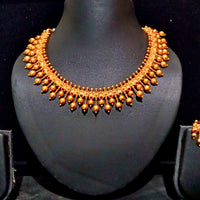 Pleasing and graceful necklaces laden with exquisite work of Temple jewelry structure and ruby stones