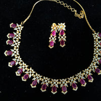 Pleasing and graceful necklace laden with exquisite work of American Diamond stones