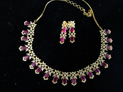 Pleasing and graceful necklace laden with exquisite work of American Diamond stones