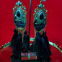 Stand-out dangler with non-precious metal base studded with trendy silk threads