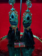 Stand-out dangler with non-precious metal base studded with trendy silk threads