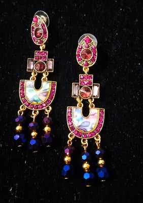 Stand-out dangler with non-precious metal base studded with trendy silk threads