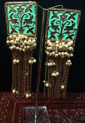 Classy earring with delicate work of pearl and  Meenakari work meant to put your fashion quotient higher .