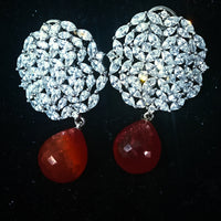 Sparkling Silver based earring with careful stitching of American Diamond