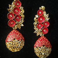 Sparkling red color earring crafted with elegant Meenakari work