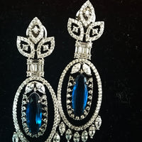 Sparkling Silver based earring with careful stitching of American Diamond