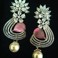 Sparkling Silver based earring with careful stitching of American Diamond