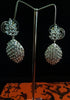Sparkling Silver based earring with careful stitching of American Diamond