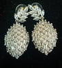 Sparkling Silver based earring with careful stitching of American Diamond