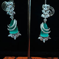 Sparkling Silver based earring with careful stitching of American Diamond