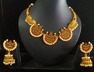 Pleasing and graceful necklaces laden with exquisite work of Temple jewelry structure and ruby stones