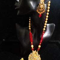 Pleasing and graceful Jaipur necklace laden with exquisite work of red & off white pearls and red crystal