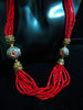 Pleasing and graceful necklace laden with exquisite work of red crystals, beautiful pearls and kundan