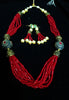 Pleasing and graceful necklace laden with exquisite work of red crystals, beautiful pearls and kundan