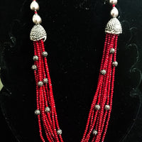 Pleasing and graceful necklace laden with exquisite work of wine colored crystals, beautiful high quality pearls